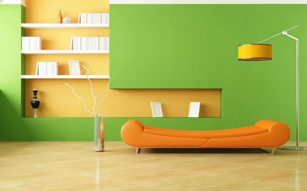 Living room with a green feature wall, yellow shelving and an orange sofa