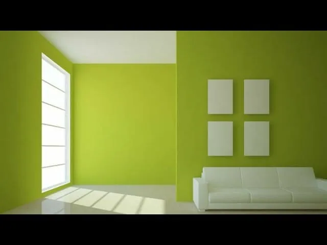 Room with lime-green walls and a white sofa
